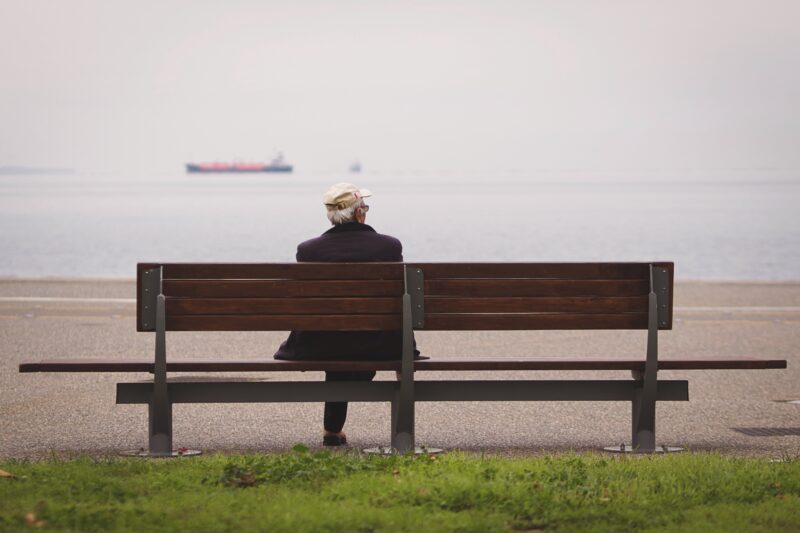 Man sat alone on a bench